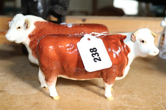 Two Beswick models, Hereford bull and cow, Champion of Champions